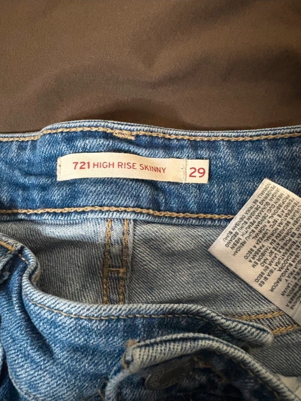 Levi's 721 High Rise Skinny Jeans - Light Blue Distressed